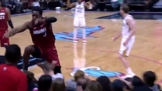Barkov 'all good' after Wade dove into him courtside during Heat game