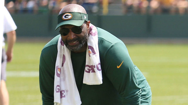 ASHWAUBENON, WI - JULY 30: Green Bay Packers linebacker Marcus Porter (59) runs in coverage while linebackers coach Winston Moss looks on during Green Bay Packers training camp at Ray Ntschke Field on July 30, 2018 in Ashwaubenon, WI.