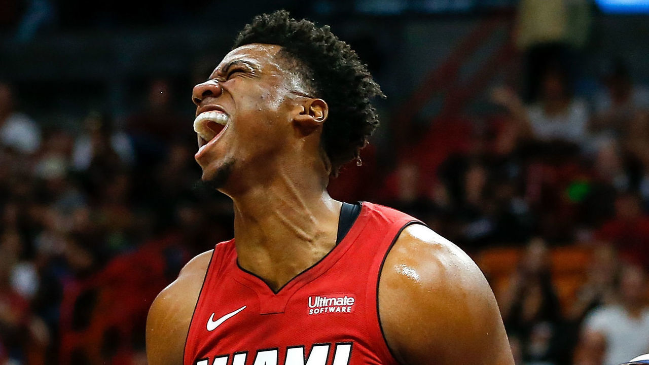 MIAMI, FL - DECEMBER 02: Hassan Whiteside #21 of the Miami Heat reacts after a dunk against the Utah Jazz during the first half at American Airlines Arena on December 2, 2018 in Miami, Florida.