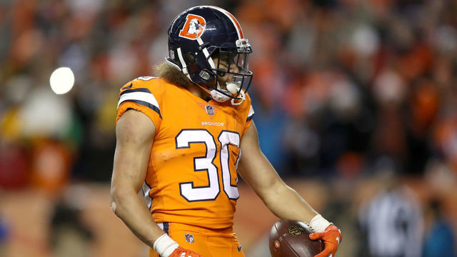 DENVER, CO - NOVEMBER 25: Phillip Lindsay #30 of the Denver Broncos celebrates scoring a touchdown against the Pittsburgh Steelers at Broncos Stadium at Mile High on November 25, 2018 in Denver, Colorado.