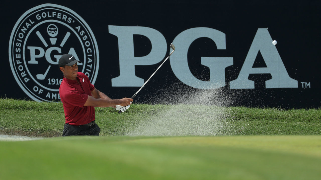 ST LOUIS, MISSOURI - AUGUST 12: Tiger Woods of the United States plays from a greenside bunker on the sixth hole during the final round of the 2018 PGA Championship at Bellerive Country Club on August 12, 2018 in St Louis, Missouri.