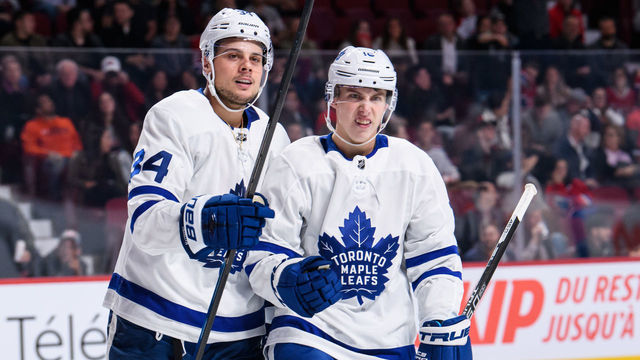 MONTREAL, QC - SEPTEMBER 26: Toronto Maple Leafs center Mitchell Marner (16) and Auston Matthews (34) celebrate during the third period of the NHL preseason game between the Toronto Maple Leafs and the Montreal Canadiens on September 26, 2018, at the Bell Centre in Montreal, QC