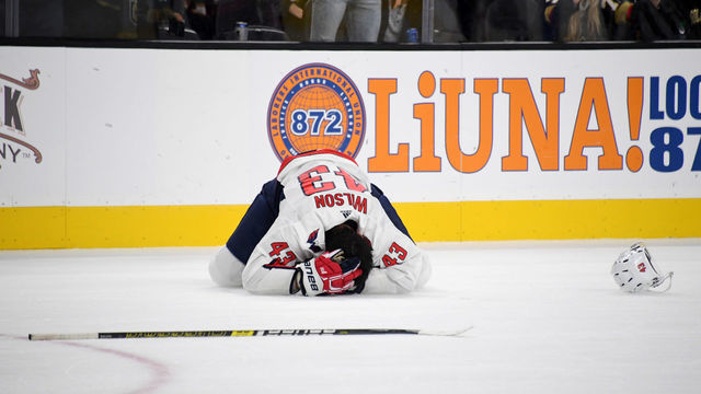 LAS VEGAS, NEVADA - DECEMBER 04: Tom Wilson #43 of the Washington Capitals reacts after he was hurt in a collision with Ryan Reaves (not pictured) #75 of the Vegas Golden Knights in the second period of their game at T-Mobile Arena on December 4, 2018 in Las Vegas, Nevada. Reaves received a five-minute major penalty for interference and a game misconduct penalty as a result of the play.