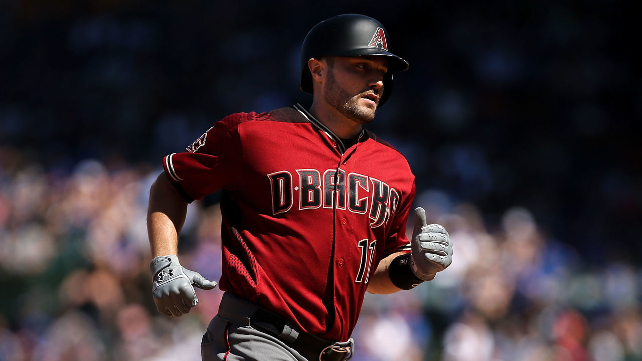 CHICAGO, IL - JULY 25: A.J. Pollock #11 of the Arizona Diamondbacks rounds the bases after hitting a home run in the seventh inning against the Chicago Cubs at Wrigley Field on July 25, 2018 in Chicago, Illinois.