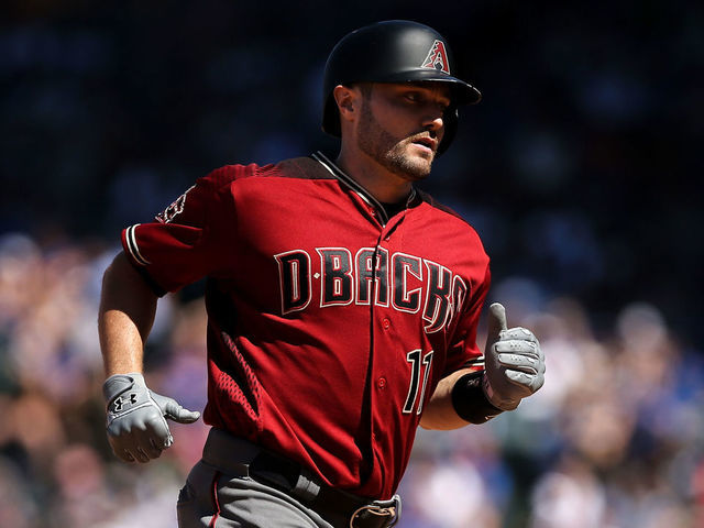 CHICAGO, IL - JULY 25: A.J. Pollock #11 of the Arizona Diamondbacks rounds the bases after hitting a home run in the seventh inning against the Chicago Cubs at Wrigley Field on July 25, 2018 in Chicago, Illinois.