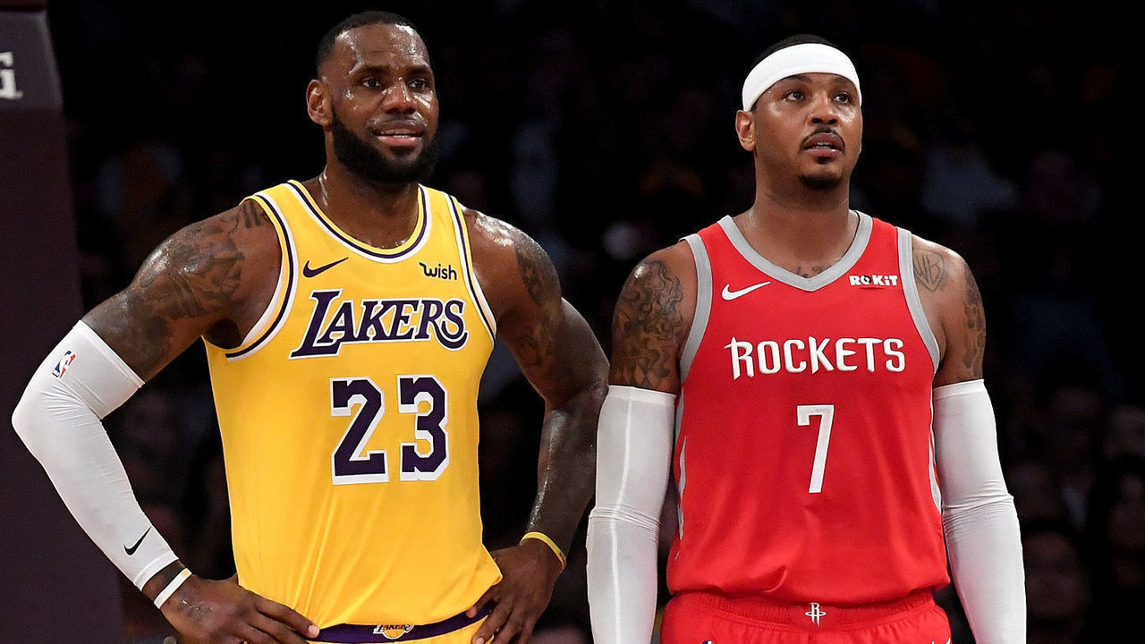 LOS ANGELES, CA - OCTOBER 20: LeBron James #23 of the Los Angeles Lakers and Carmelo Anthony #7 of the Houston Rockets wait for and inbound at Staples Center on October 20, 2018 in Los Angeles, California.