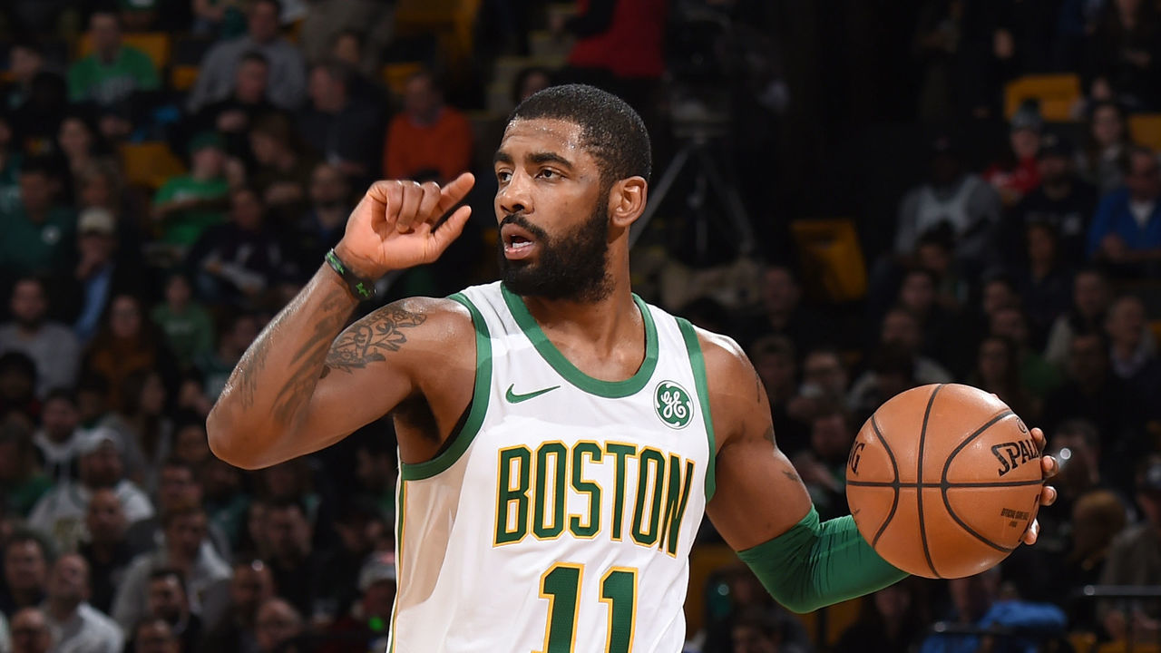 BOSTON, MA - DECEMBER 6: Kyrie Irving #11 of the Boston Celtics handles the ball against the New York Knicks on December 6, 2018 at the TD Garden in Boston, Massachusetts. NOTE TO USER: User expressly acknowledges and agrees that, by downloading and/or using this photograph, user is consenting to the terms and conditions of the Getty Images License Agreement. Mandatory Copyright Notice: Copyright 2018 NBAE