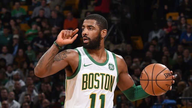 BOSTON, MA - DECEMBER 6: Kyrie Irving #11 of the Boston Celtics handles the ball against the New York Knicks on December 6, 2018 at the TD Garden in Boston, Massachusetts. NOTE TO USER: User expressly acknowledges and agrees that, by downloading and/or using this photograph, user is consenting to the terms and conditions of the Getty Images License Agreement. Mandatory Copyright Notice: Copyright 2018 NBAE