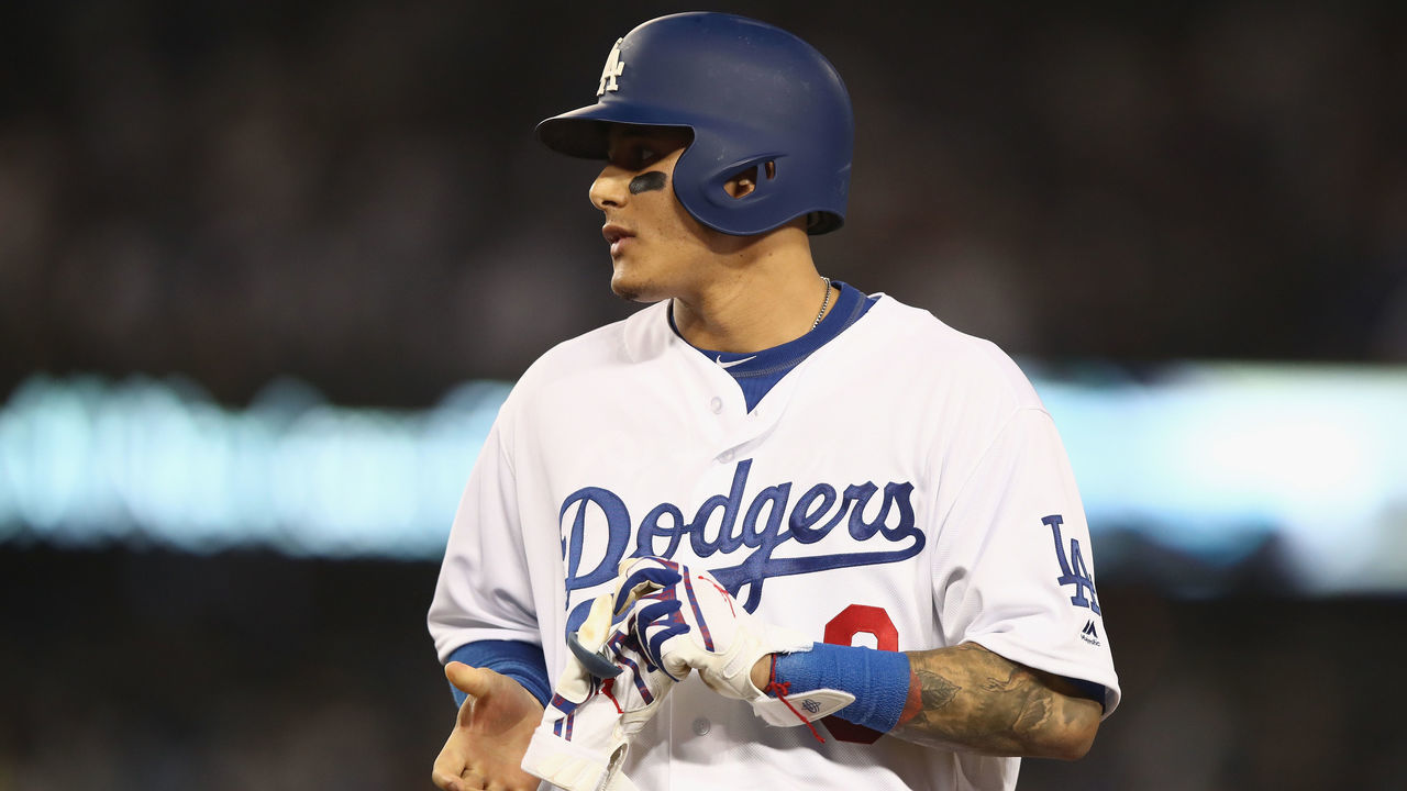 LOS ANGELES, CA - OCTOBER 26: Manny Machado #8 of the Los Angeles Dodgers reacts after flying out during the tenth inning against the Boston Red Sox in Game Three of the 2018 World Series at Dodger Stadium on October 26, 2018 in Los Angeles, California.
