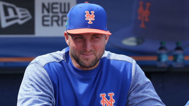PORT ST. LUCIE, FL - MARCH 7: Tim Tebow #83 of the New York Mets look on from the dugout prior to the spring training game against the New York Yankees at First Date Field on March 7, 2018 in Port St. Lucie, Florida. The Yankees defeated the Mets 11-4.