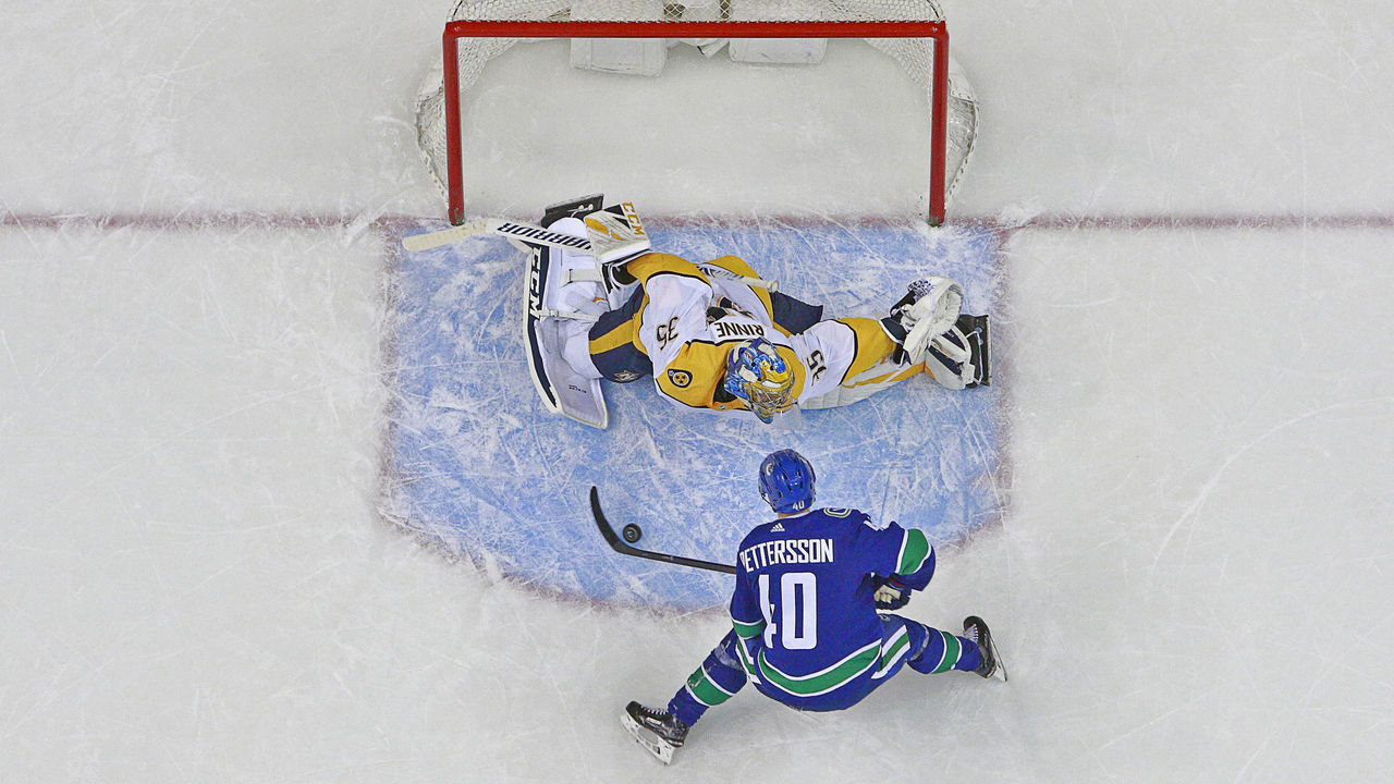 VANCOUVER, BC - DECEMBER 6: Elias Pettersson #40 of the Vancouver Canucks scores on a penalty shot against Pekka Rinne #35 of the Nashville Predators during their NHL game at Rogers Arena December 6, 2018 in Vancouver, British Columbia, Canada.
