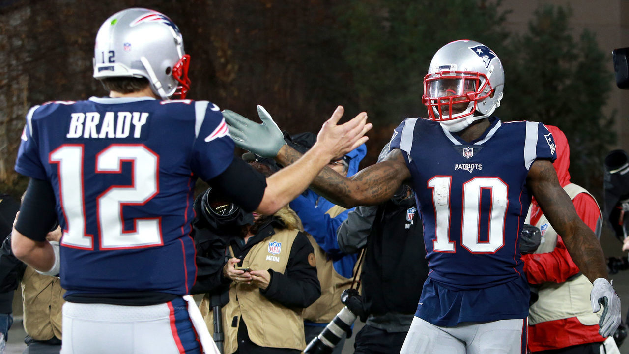 FOXBOROUGH, MA - DECEMBER 2: Patriots quarterback Tom Brady (left) congratulates Josh Gordon after his touchdown in the third quarter. The New England Patriots play against the Minnesota Vikings at Gillette Stadium in Foxborough on Dec. 02, 2018.