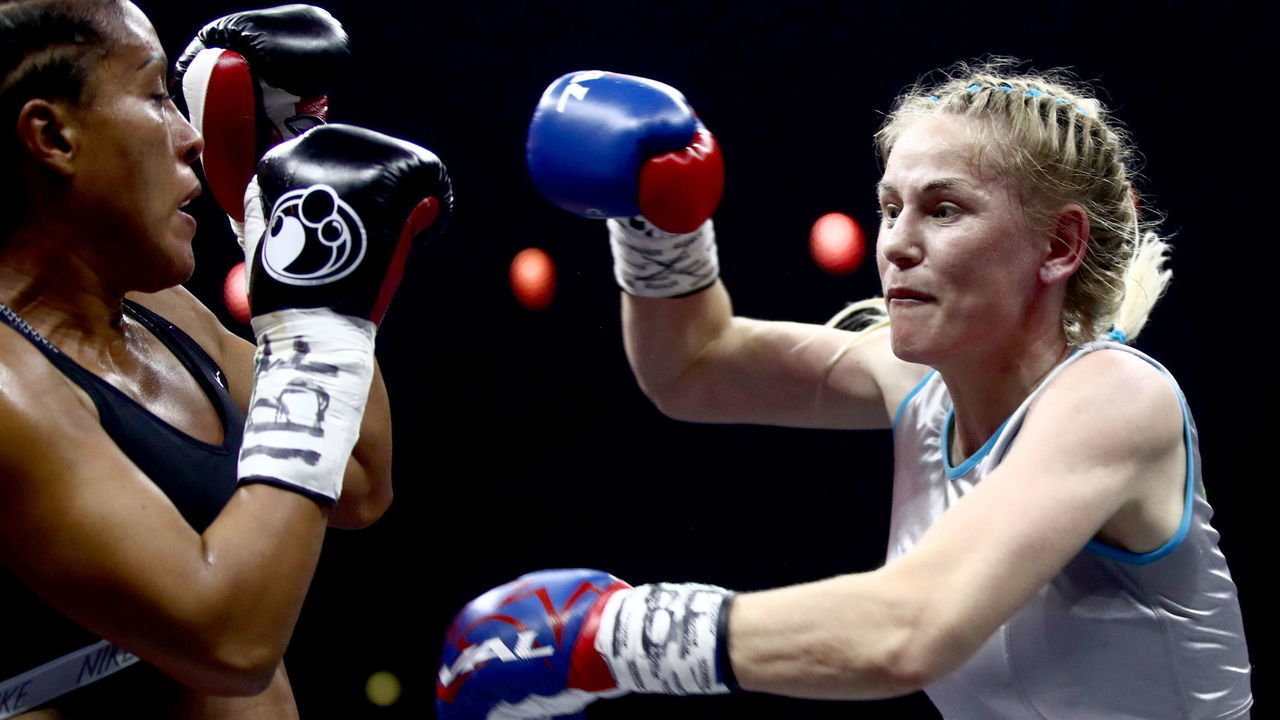 MOSCOW, RUSSIA - JULY 21, 2018: Cecilia Braekhus of Norway, and Inna Sagaydakovskaya of Russia, in the women's WBC/IBF/IBO/WBO/WBA welterweight title bout as part of the WBSS (World Boxing Super Series) cruiserweight final at Moscow's Olympiyskiy Arena. Valery Sharifulin/TASS