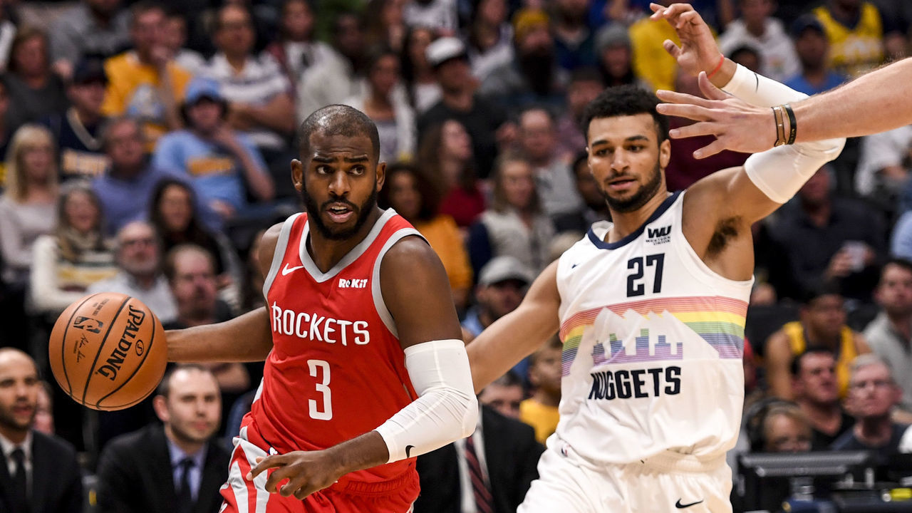 DENVER, CO - NOVEMBER 13: Chris Paul (3) of the Houston Rockets drives on Jamal Murray (27) of the Denver Nuggets during the second half of the Rockets' 109-99 win on Monday, November 13, 2018. The Denver Nuggets hosted the Houston Rockets at the Pepsi Center.