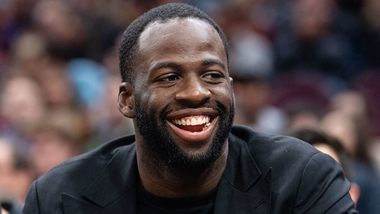 CLEVELAND, OH - DECEMBER 5: Draymond Green #23 of the Golden State Warriors jokes with fans from the bench during the second half against the Cleveland Cavaliers at Quicken Loans Arena on December 5, 2018 in Cleveland, Ohio. The Warriors defeated the Cavaliers 129-105. NOTE TO USER: User expressly acknowledges and agrees that, by downloading and/or using this photograph, user is consenting to the terms and conditions of the Getty Images License Agreement.