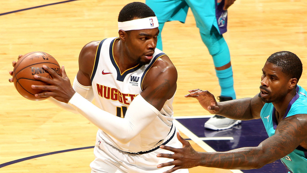 CHARLOTTE, NC - DECEMBER 7: Paul Millsap #4 of the Denver Nuggets handles the ball against the Charlotte Hornets on December 7, 2018 at Spectrum Center in Charlotte, North Carolina. Mandatory Copyright Notice: Copyright 2018 NBAE