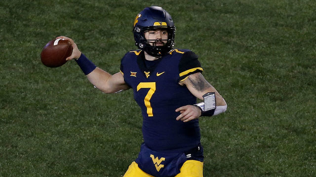 MORGANTOWN, WV - NOVEMBER 23: Will Grier #7 of the West Virginia Mountaineers in action against the Oklahoma Soonersrs on November 23, 2018 at Mountaineer Field in Morgantown, West Virginia.