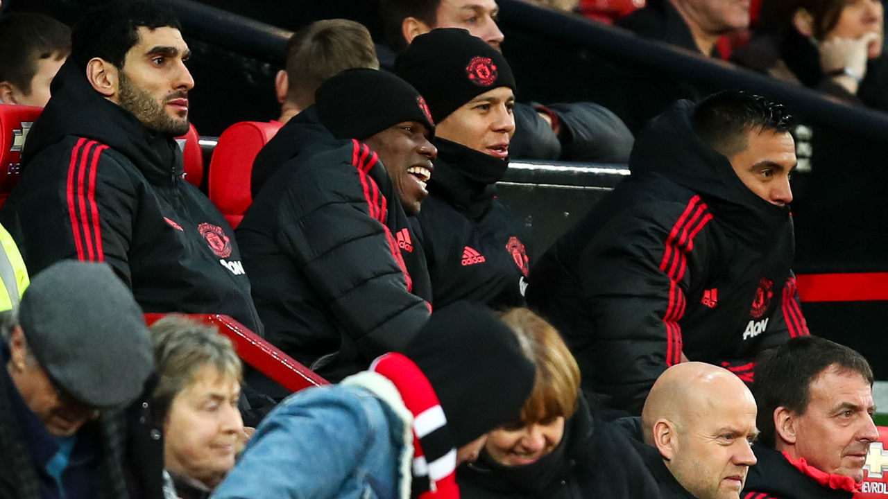 MANCHESTER, ENGLAND - DECEMBER 08: Paul Pogba of Manchester United smiling and laughing sat on the bench during the Premier League match between Manchester United and Fulham FC at Old Trafford on December 8, 2018 in Manchester, United Kingdom.