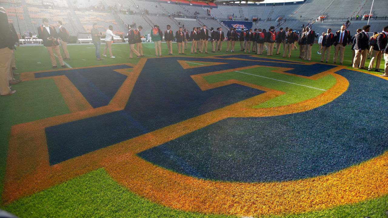 AUBURN, AL - NOVEMBER 3: Members of the Auburn Tigers circle around their logo prior to their game against the Texas A&M Aggies at Jordan-Hare Stadium on November 3 2018 in Auburn, Alabama.