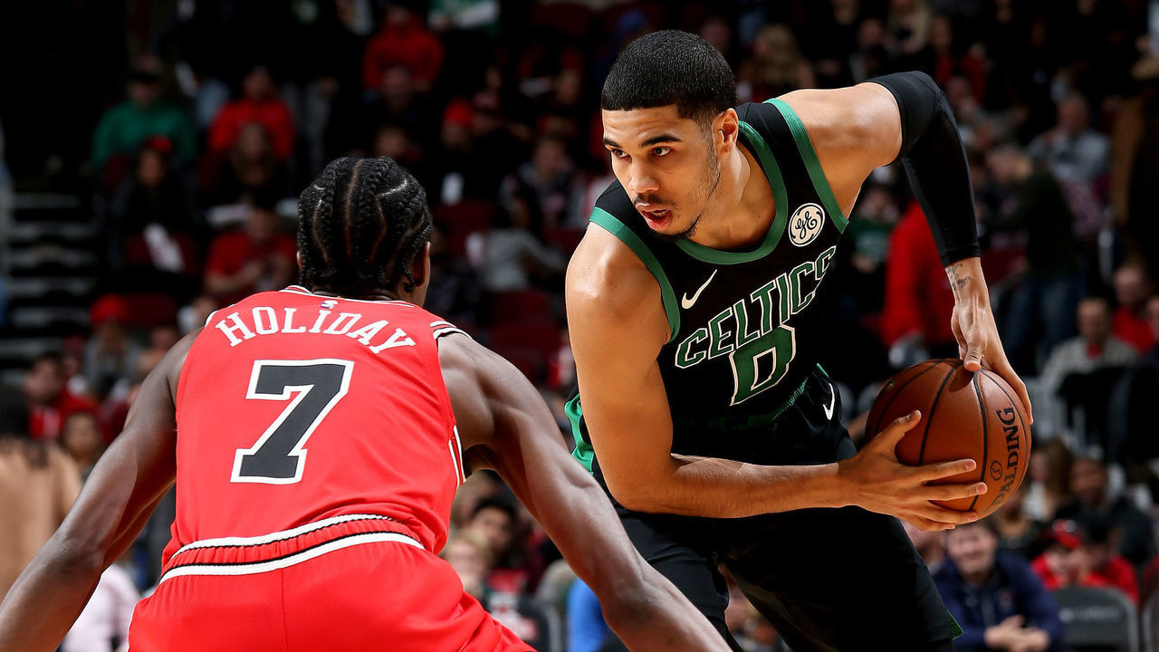 CHICAGO, IL - DECEMBER 8: Jayson Tatum #0 of the Boston Celtics handles the ball against the Chicago Bulls on December 8, 2018 at the United Center in Chicago, Illinois. Mandatory Copyright Notice: Copyright 2018 NBAE