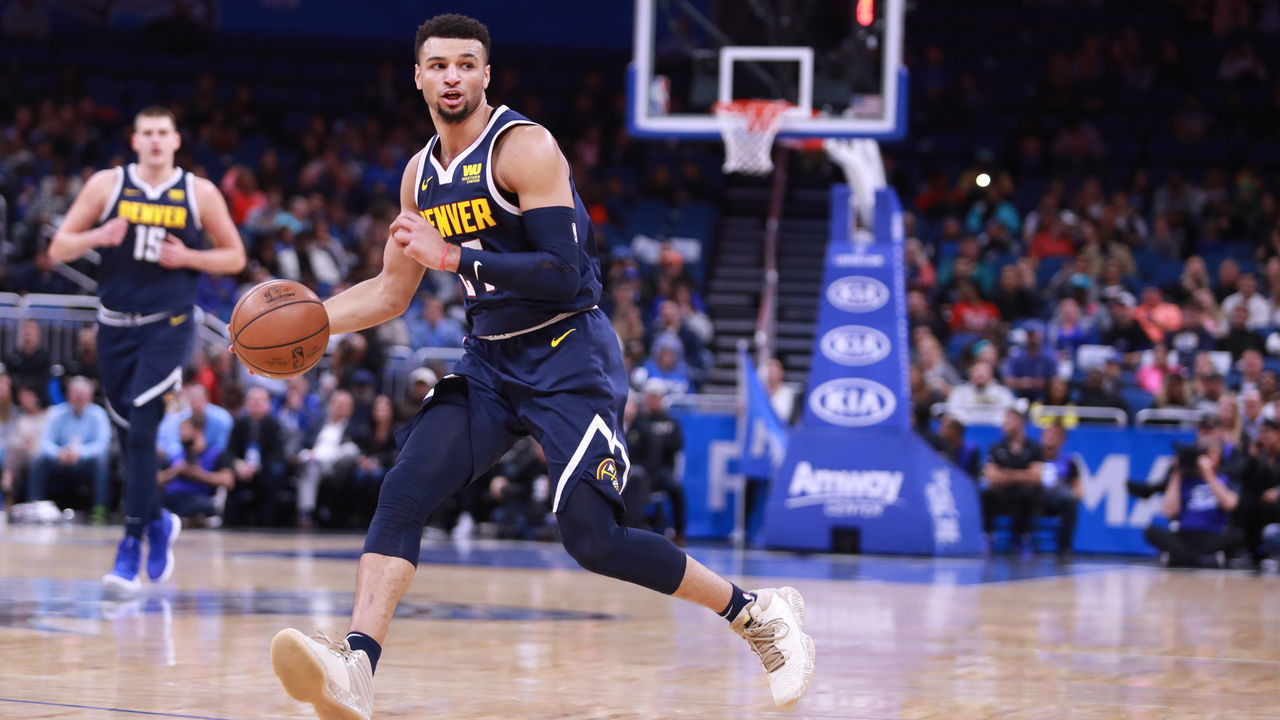 ORLANDO, FLORIDA - DECEMBER 05: Jamal Murray #27 of the Denver Nuggets charges down the court against the Orlando Magic in the first half at Amway Center on December 05, 2018 in Orlando, Florida.