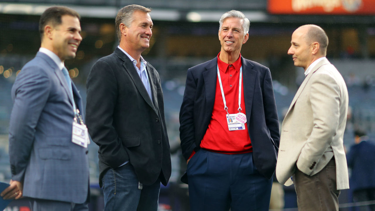NEW YORK, NY - OCTOBER 8: President of Baseball Operations for the Boston Red Sox David Dombrowski talks with New York Yankees General Manager Brian Cashman during batting practice prior to Game 3 of the ALDS between the Boston Red Sox and the New York Yankees at Yankee Stadium on Monday, October 8, 2018 in the Bronx borough of New York City.