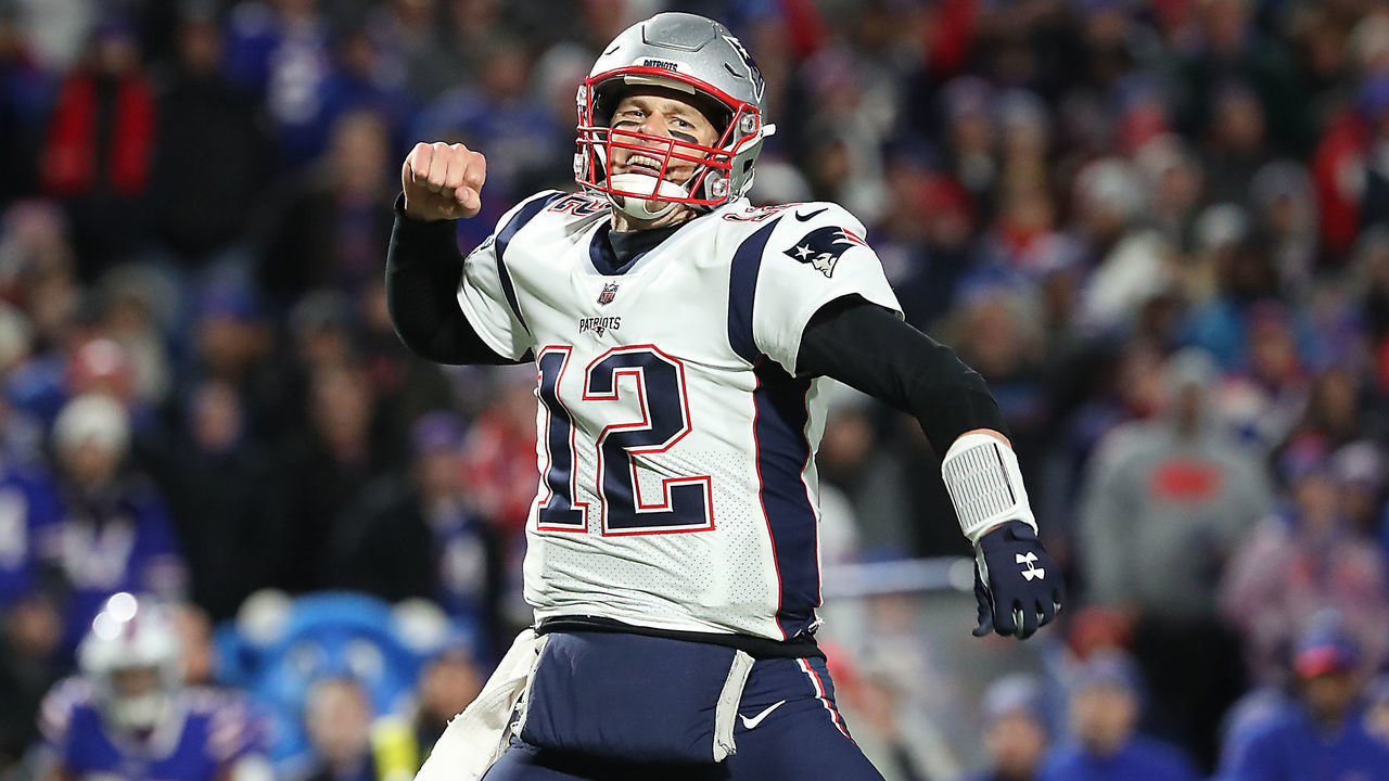 ORCHARD PARK, NY - OCTOBER 29: New England Patriots quarterback Tom Brady celebrates teammate James White's 1-yard touchdown run during the fourth quarter. The New England Patriots visit the Buffalo Bills in a regular season NFL football game at New Era Field in Orchard Park, NY on Oct. 29, 2018.