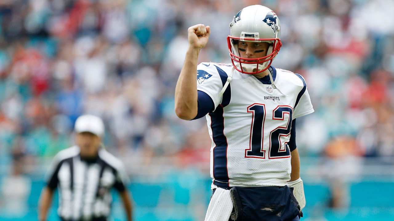 MIAMI, FL - DECEMBER 09: Tom Brady #12 of the New England Patriots reacts during the first half against the Miami Dolphins at Hard Rock Stadium on December 9, 2018 in Miami, Florida.
