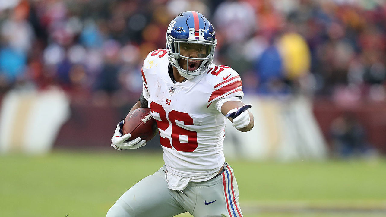 LANDOVER, MD - DECEMBER 09: Running back Saquon Barkley #26 of the New York Giants carries the ball in the second quarter against the Washington Redskins at FedExField on December 9, 2018 in Landover, Maryland.