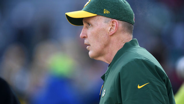 GREEN BAY, WISCONSIN - DECEMBER 09: Head coach Joe Philbin of the Green Bay Packers watches his team during warmups before a game against the Atlanta Falcons at Lambeau Field on December 09, 2018 in Green Bay, Wisconsin.