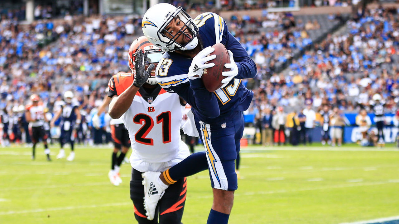 CARSON, CA - DECEMBER 09: Wide receiver Keenan Allen #13 of the Los Angeles Chargers makes a catch in front of defensive back Darqueze Dennard #21 of the Cincinnati Bengals for a touchdown in the first quarter to lead 7-0 at StubHub Center on December 9, 2018 in Carson, California.
