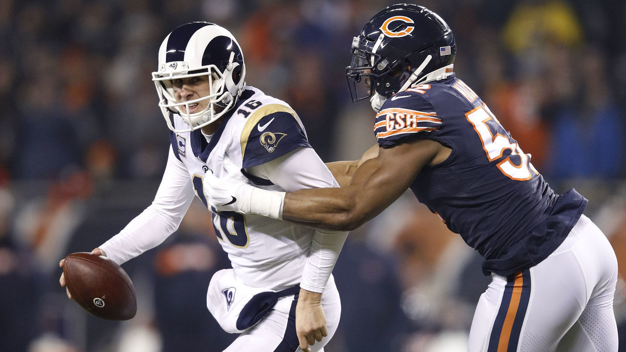 CHICAGO, IL - DECEMBER 09: Quarterback Jared Goff #16 of the Los Angeles Rams receives pressure from Khalil Mack #52 of the Chicago Bears in the first quarter at Soldier Field on December 9, 2018 in Chicago, Illinois.