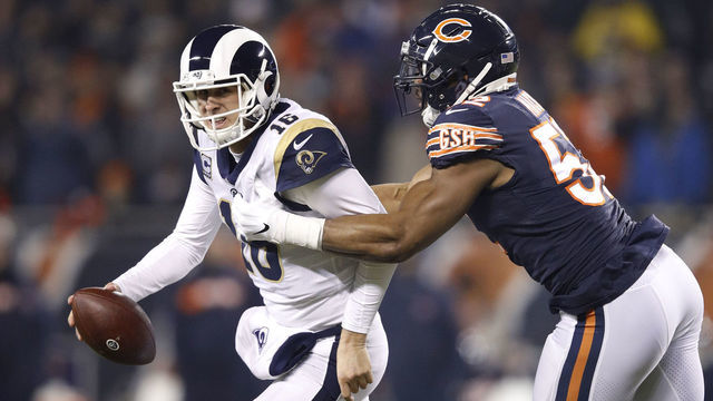 CHICAGO, IL - DECEMBER 09: Quarterback Jared Goff #16 of the Los Angeles Rams receives pressure from Khalil Mack #52 of the Chicago Bears in the first quarter at Soldier Field on December 9, 2018 in Chicago, Illinois.