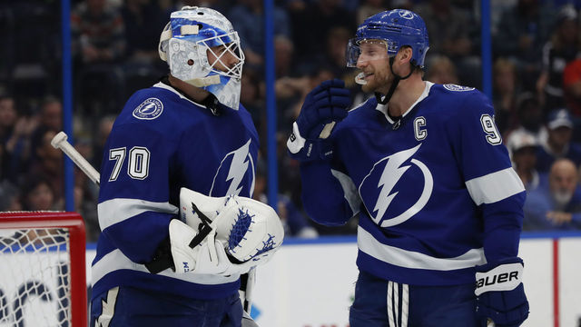 TAMPA, FL - DECEMBER 08: Tampa Bay Lightning goaltender Louis Domingue (70) talks to Tampa Bay Lightning center Steven Stamkos (91) in the third period of the NHL game between the Colorado Avalanche and Tampa Bay Lightning on December 08, 2018 at Amalie Arena in Tampa,FL.