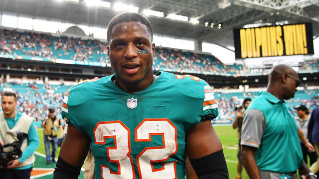 MIAMI, FL - DECEMBER 09: Kenyan Drake #32 of the Miami Dolphins after defeating the New England Patriots 34-33 at Hard Rock Stadium on December 9, 2018 in Miami, Florida.
