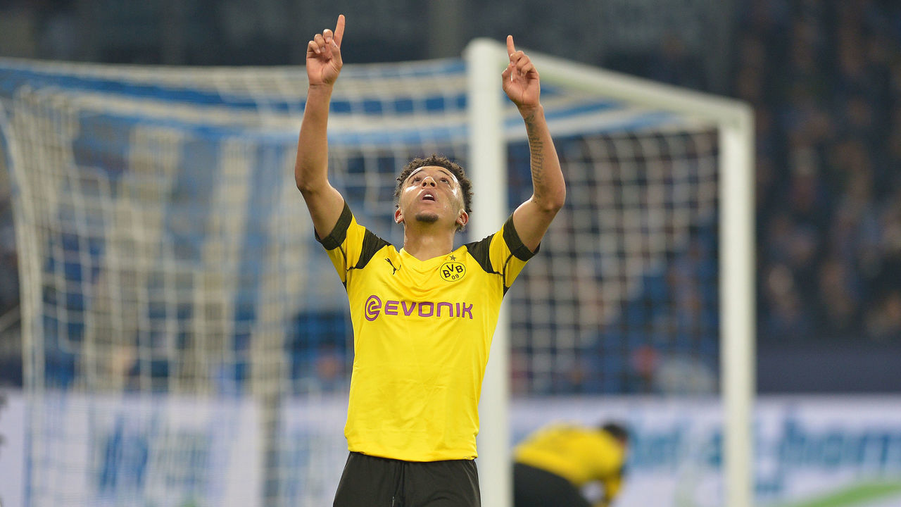 GELSENKIRCHEN, GERMANY - DECEMBER 08: Jadon Sancho of Dortmund celebrates after scoring his team's second goal during the Bundesliga match between FC Schalke 04 and Borussia Dortmund at Veltins-Arena on December 8, 2018 in Gelsenkirchen, Germany.