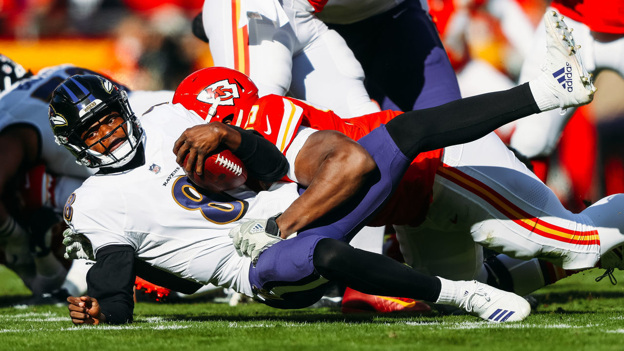 KANSAS CITY, MO - DECEMBER 9: Chris Jones #95 of the Kansas City Chiefs sacks Lamar Jackson #8 of the Baltimore Ravens during the first quarter of the game at Arrowhead Stadium on December 9, 2018 in Kansas City, Missouri.