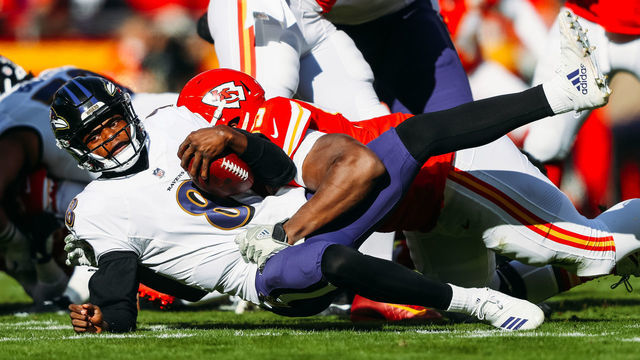 KANSAS CITY, MO - DECEMBER 9: Chris Jones #95 of the Kansas City Chiefs sacks Lamar Jackson #8 of the Baltimore Ravens during the first quarter of the game at Arrowhead Stadium on December 9, 2018 in Kansas City, Missouri.