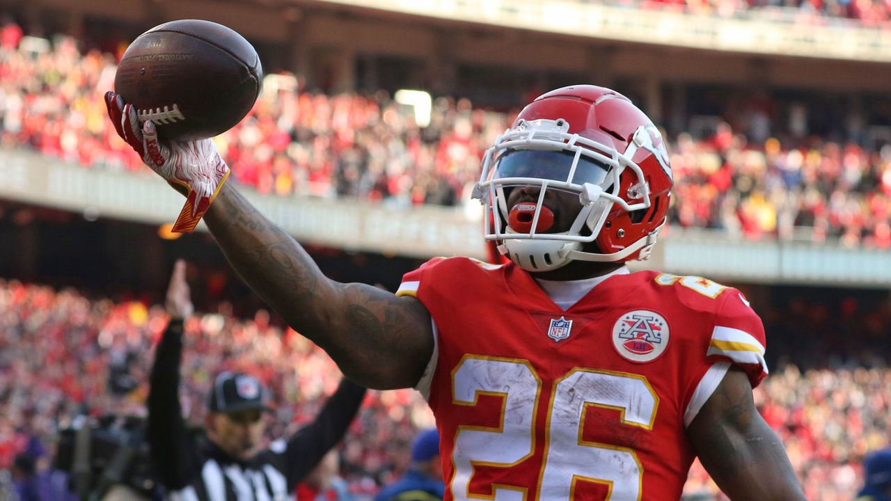 KANSAS CITY, MO - DECEMBER 09: Kansas City Chiefs running back Damien Williams (26) celebrates after scoring the game tying touchdown on a 5-yard reception late in the fourth quarter of an NFL game between the Baltimore Ravens and Kansas City Chiefs on December 9, 2018 at Arrowhead Stadium in Kansas City, MO.