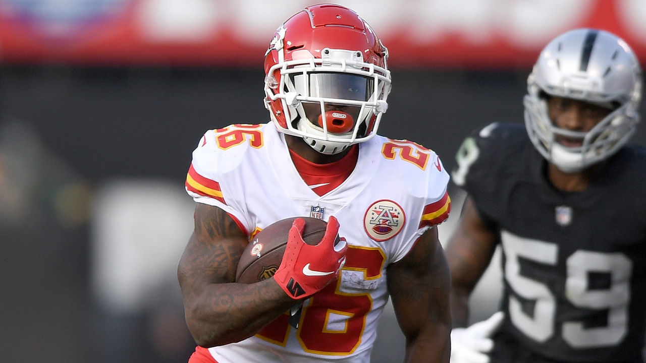 OAKLAND, CA - DECEMBER 02: Damien Williams #26 of the Kansas City Chiefs carries the ball against the Oakland Raiders during the second half of an NFL football game at Oakland-Alameda County Coliseum on December 2, 2018 in Oakland, California.