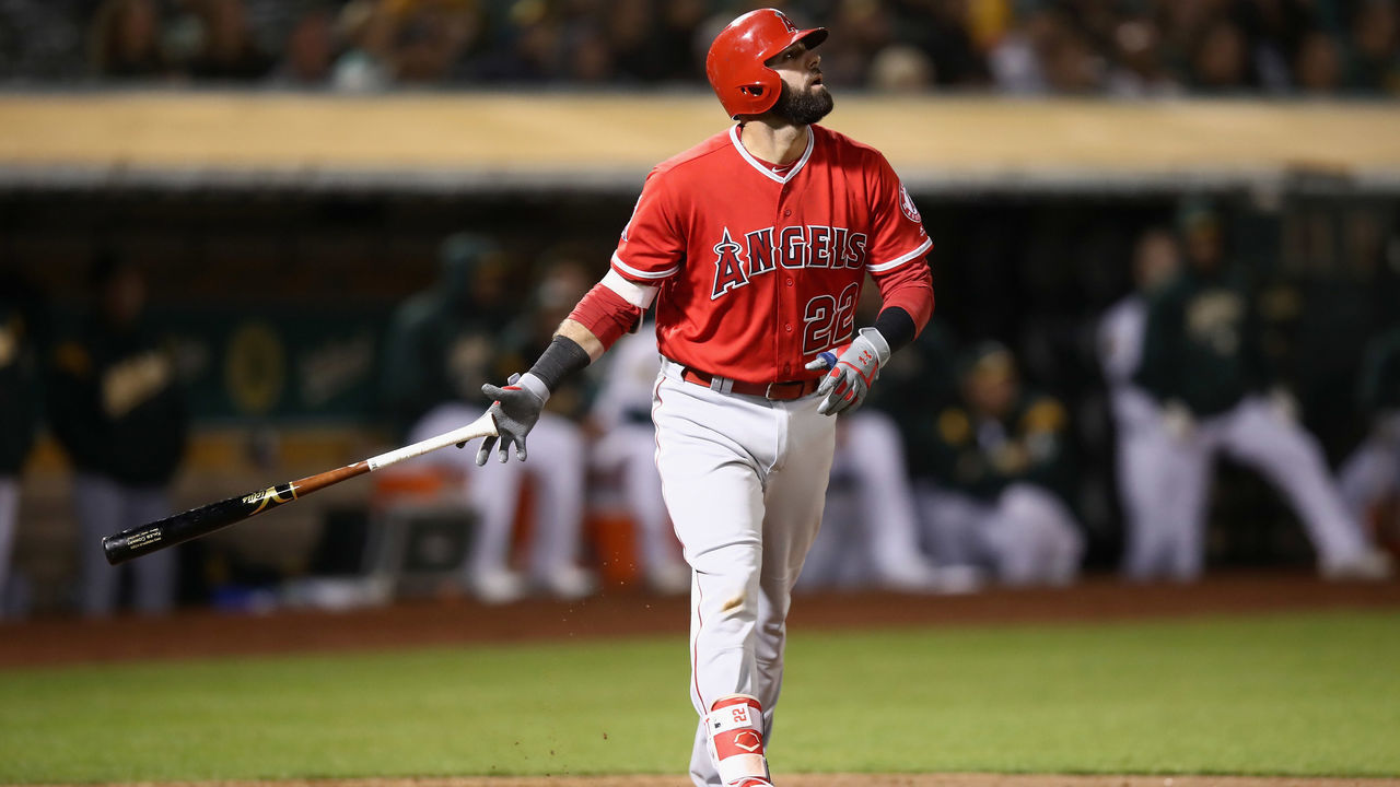 OAKLAND, CA - SEPTEMBER 18: Kaleb Cowart #22 of the Los Angeles Angels hits a grand slam home run in the sixth inning against the Oakland Athletics at Oakland Alameda Coliseum on September 18, 2018 in Oakland, California.