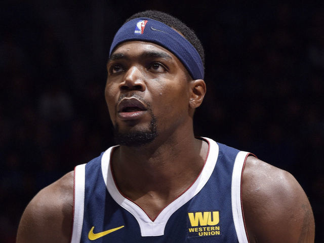 ORLANDO, FL - DECEMBER 5: Paul Millsap #4 of the Denver Nuggets shoots a free throw during the game against the Orlando Magic on December 5, 2018 at Amway Center in Orlando, Florida. Mandatory Copyright Notice: Copyright 2018 NBAE