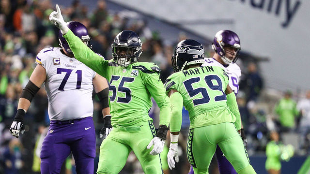SEATTLE, WA - DECEMBER 10: Frank Clark #55 of the Seattle Seahawks celebrates a second quarter defensive stop against the Minnesota Vikings at CenturyLink Field on December 10, 2018 in Seattle, Washington.