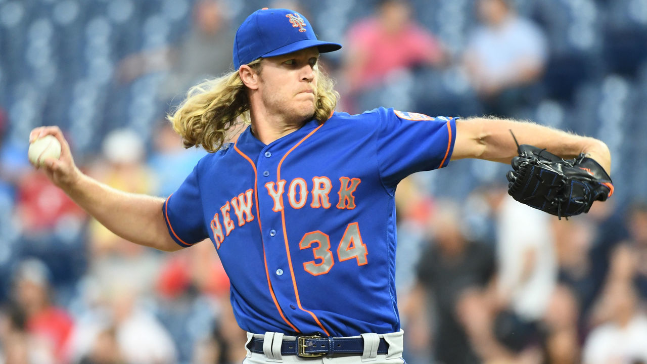 PHILADELPHIA, PA - SEPTEMBER 19: New York Mets Starting pitcher Noah Syndergaard (34) winds up to pitch during the MLB game between the New York Mets and the Philadelphia Phillies on September 19, 2018, at Citizens Bank Park in Philadelphia, PA.