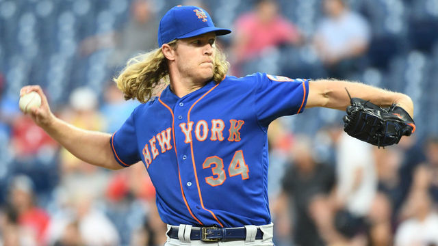 PHILADELPHIA, PA - SEPTEMBER 19: New York Mets Starting pitcher Noah Syndergaard (34) winds up to pitch during the MLB game between the New York Mets and the Philadelphia Phillies on September 19, 2018, at Citizens Bank Park in Philadelphia, PA.