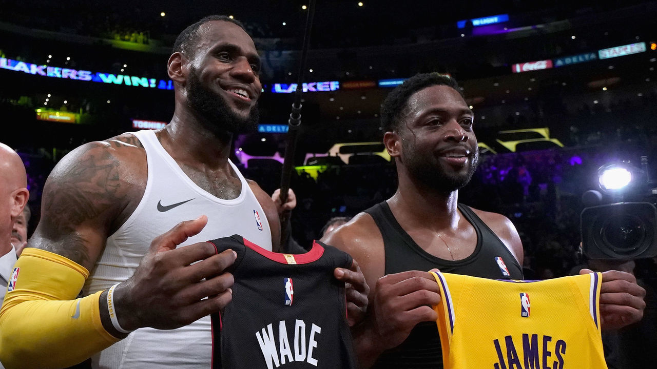 LOS ANGELES, CA - DECEMBER 10: LeBron James #23 of the Los Angeles Lakers and Dwyane Wade #3 of the Miami Heat pose for a photo after exchanging jerseys, as Wade plans to retire at the end of the season, after a 108-105 Laker win at Staples Center on December 10, 2018 in Los Angeles, California.