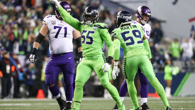 SEATTLE, WA - DECEMBER 10: Frank Clark #55 of the Seattle Seahawks celebrates a second quarter defensive stop against the Minnesota Vikings at CenturyLink Field on December 10, 2018 in Seattle, Washington.