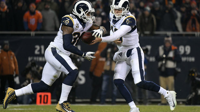 CHICAGO, IL - DECEMBER 09: Los Angeles Rams quarterback Jared Goff (16) hands the football to Los Angeles Rams running back Todd Gurley (30) in action during an NFL game between the Los Angeles Rams and the Chicago Bears on December 09, 2018 at Soldier Field in Chicago, IL.