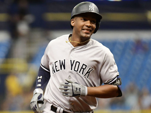 ST PETERSBURG, FL - SEPTEMBER 27: Miguel Andujar #41 of the New York Yankees hits a three-run homer in the first inning against the Tampa Bay Rays on September 27, 2018 at Tropicana Field in St Petersburg, Florida.