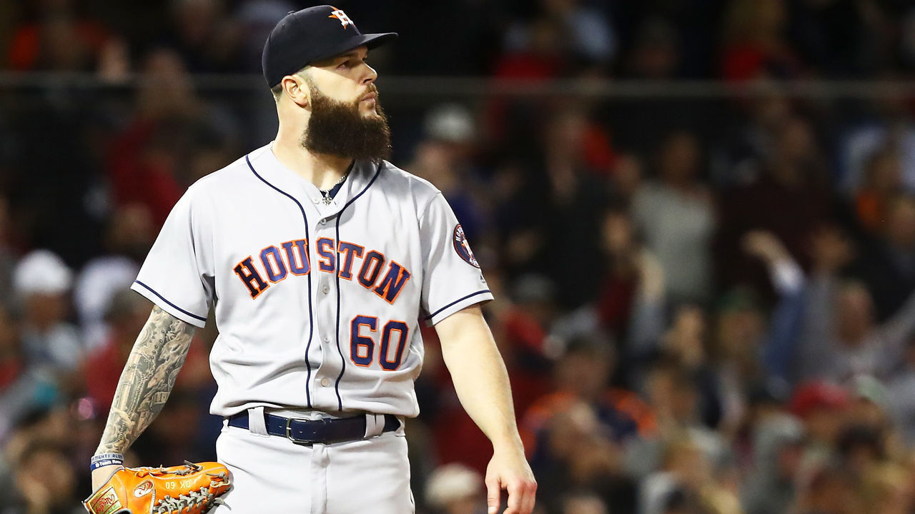 BOSTON, MA - SEPTEMBER 9: Dallas Keuchel #60 of the Houston Astros looks on as J.D. Martinez of the Boston Red Sox rounds the bases on his three-run home run in the fifth inning of a game at Fenway Park on September 9, 2018 in Boston, Massachusetts.
